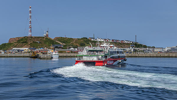 High speed craft Halunder Jet arriving at the port of Heligoland.