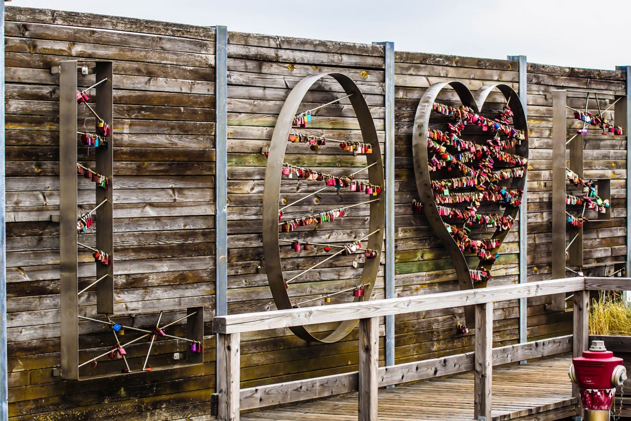 LOVE sign with padlocks at the harbour of List